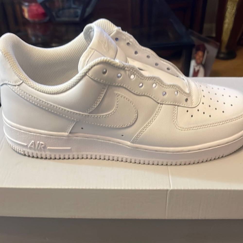 Men’s Air Force One’s worn once.  No shoe strings. Really nice pair of shoes